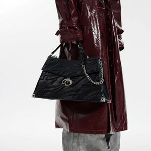 Side view of white 3D relief streetwear shoulder bag