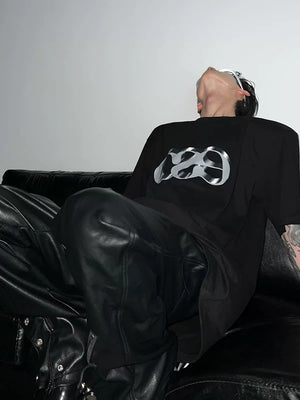 Model wearing white 3D letter print streetwear tee in city setting