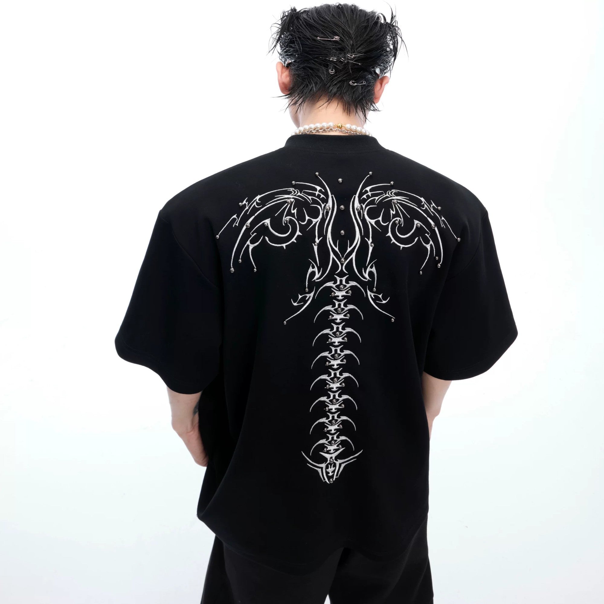 Front view of men's loose fit 3D spine embroidered streetwear tee