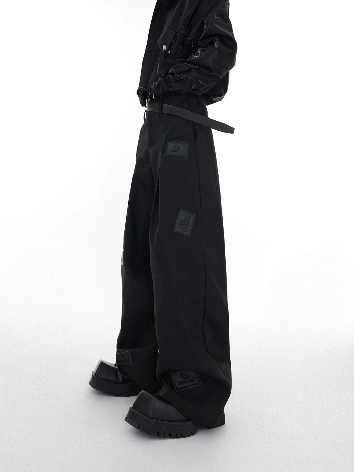 Black Wide-Leg Tailored Trousers with Embossed Detail - main image 1