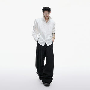 Street style shot of the pleated pearl shirt in an urban setting