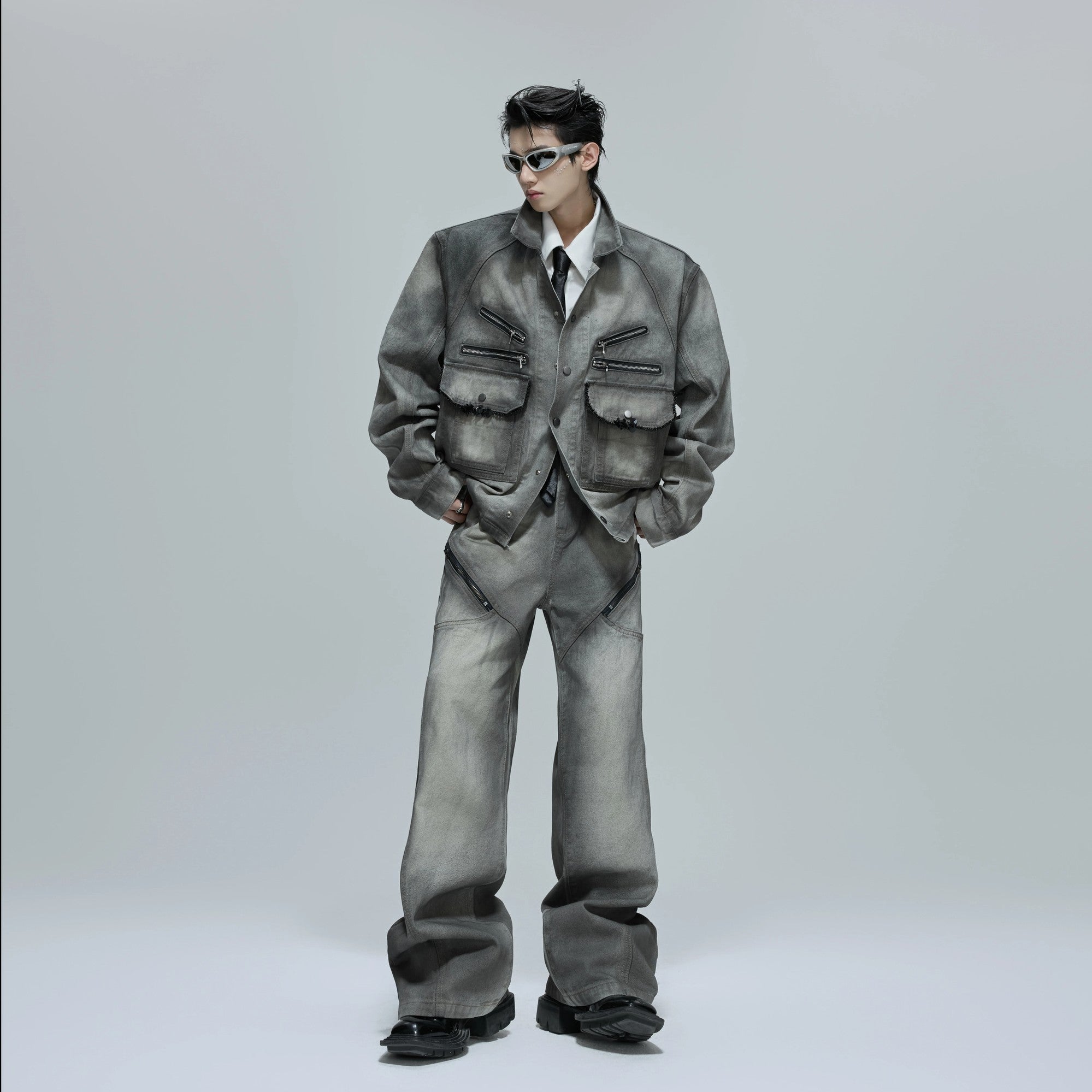 Full view of the vintage cement gray denim jacket and flared pants set.