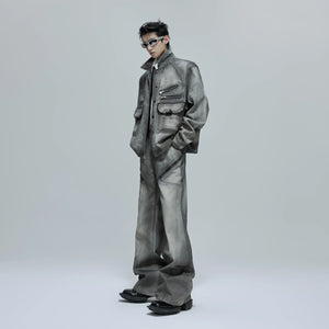 Male model wearing the full cement gray denim streetwear set in the city.