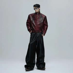 Male model wearing baggy crinkle pants in an urban street setting