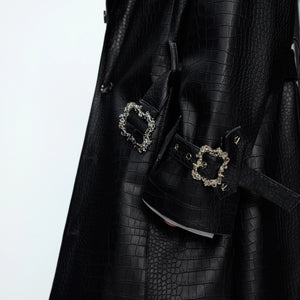 Full length shot of the long croc-embossed leather windbreaker