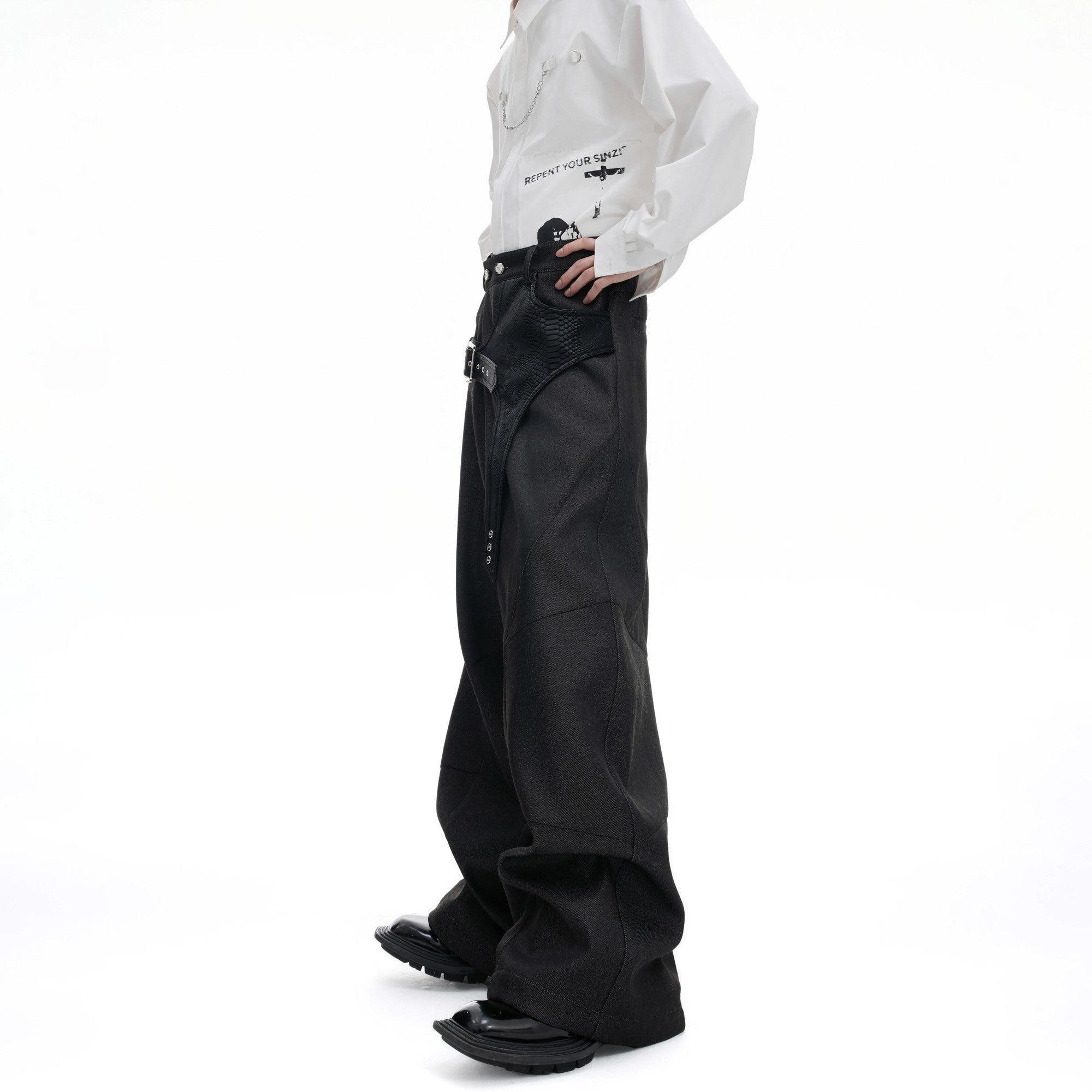 Men's black straight leg trousers with faux crocodile skin patchwork.