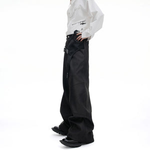 Men's black straight leg trousers with faux crocodile skin patchwork.