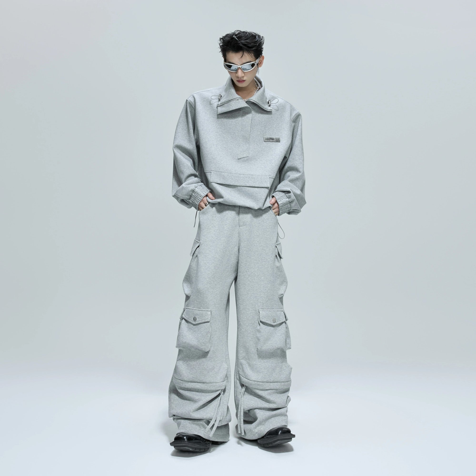 Unisex grey cropped stand collar sweatshirt and cargo pants set front view