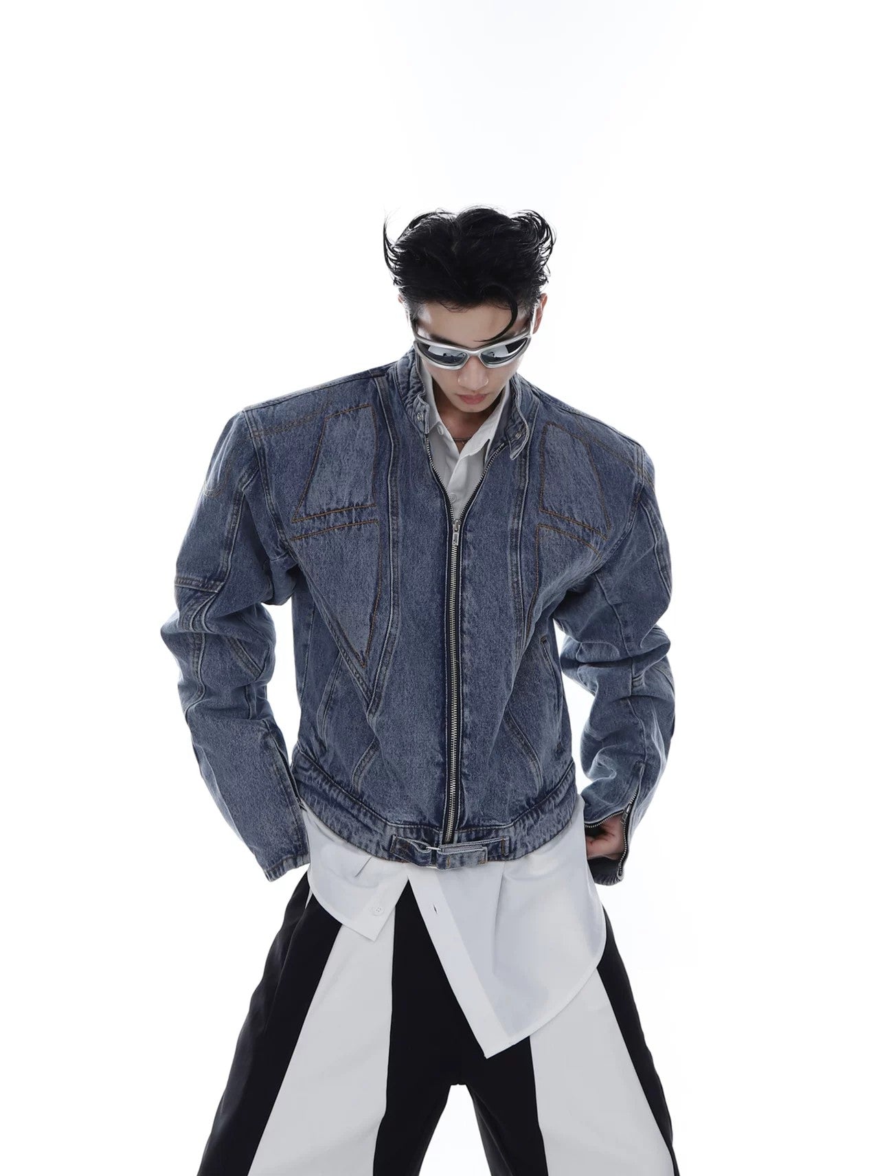 Front view of light blue cropped washed denim moto jacket with padded shoulders