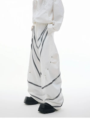 desc::deconstructed-3d-cut-metal-rivet-trousers-detail-img-2