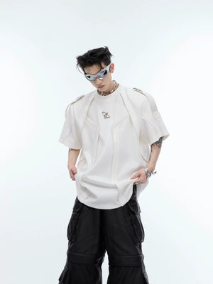 Close up of black deconstructed streetwear tee with 3D patchwork details