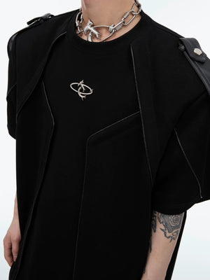 Model wearing deconstructed oversized tee in a street setting