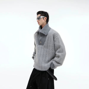 Front view of a gray deconstructed button turtleneck knit sweater