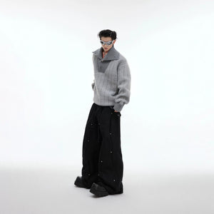 Stylized lifestyle shot of the deconstructed knit sweater at a party