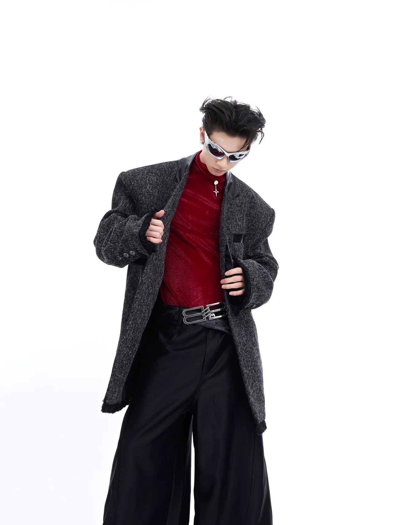 Front view of a gray deconstructed collarless streetwear blazer for men.