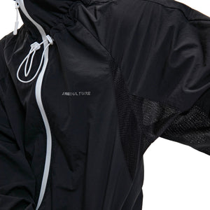 Flatlay of the black waterproof cropped sun jacket