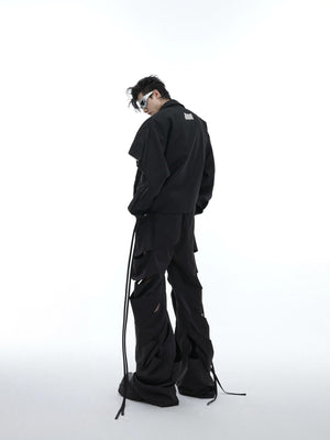 Full body shot of model wearing deconstructed flare cargo pants