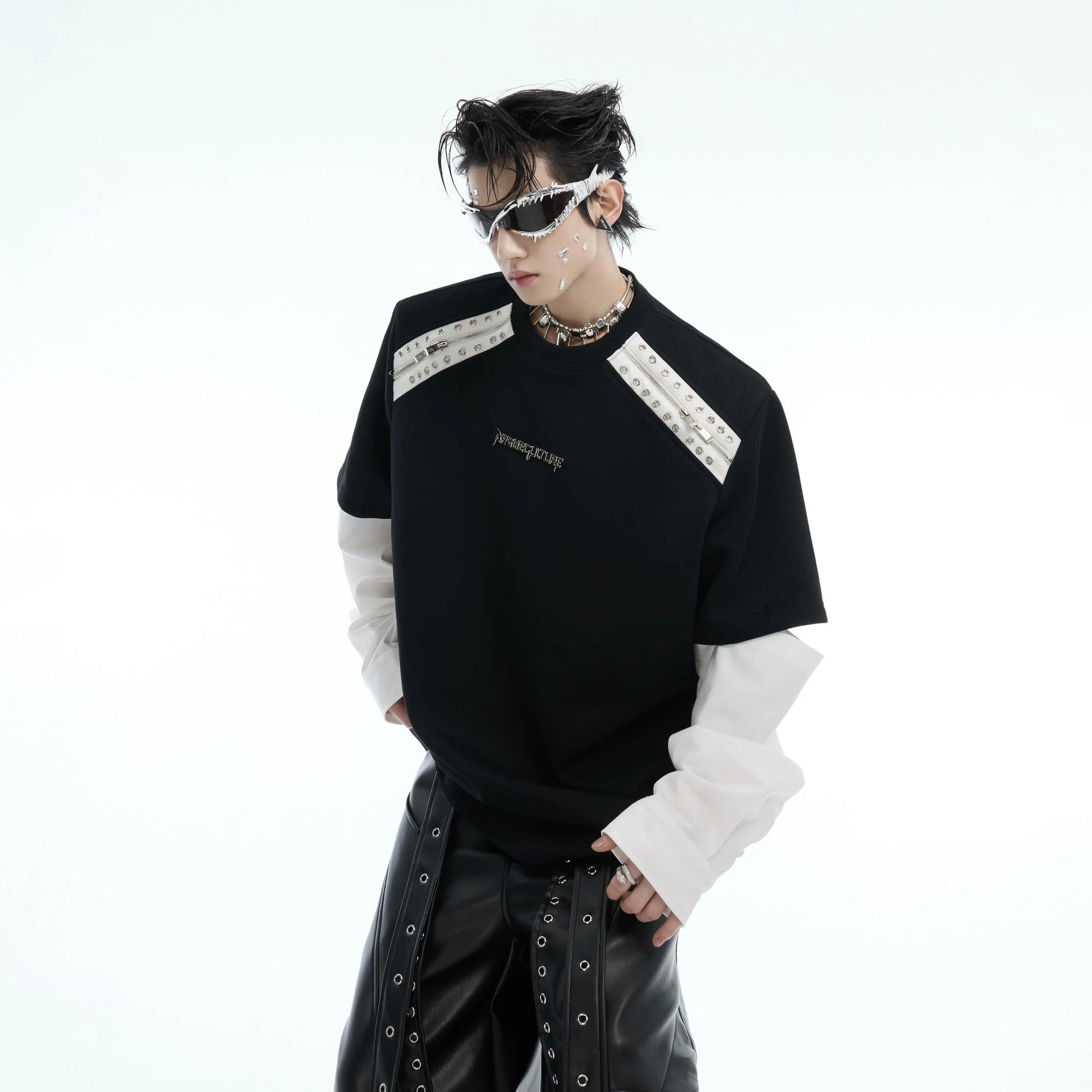 Front view of deconstructed patchwork tee with detachable sleeves