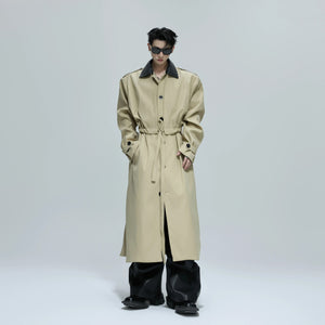 Close-up of the braided leather texture on a streetwear trench coat