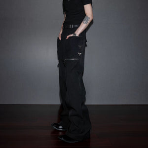 Close up of gothic embossed metal hardware on streetwear pants