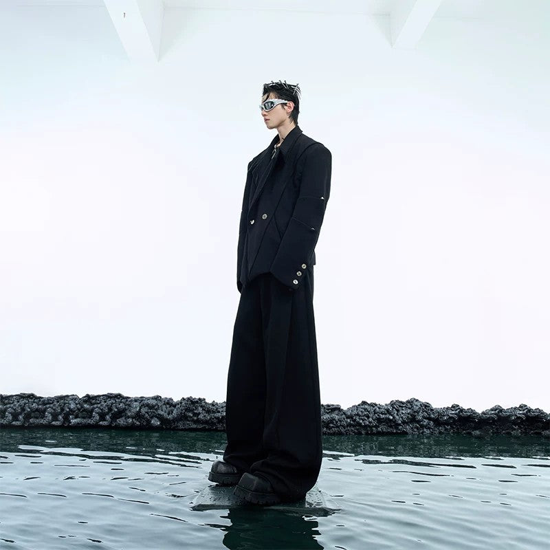 Close up of metal button detailing on a streetwear blazer