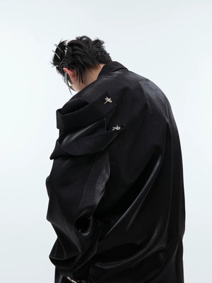 Back view of a loose fit black suit jacket with center vent