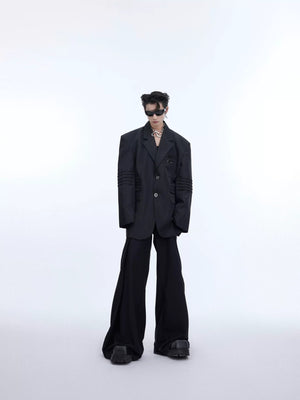 Side view of a structural padded shoulder blazer with liquid metal finish