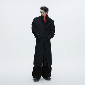 Close up of the stainless steel branding plate on the back of the coat