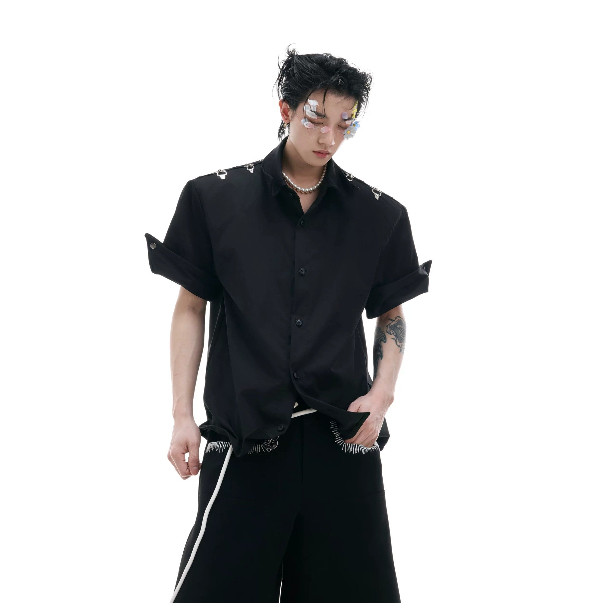 Front view of white deconstructed short sleeve shirt with metal buckle