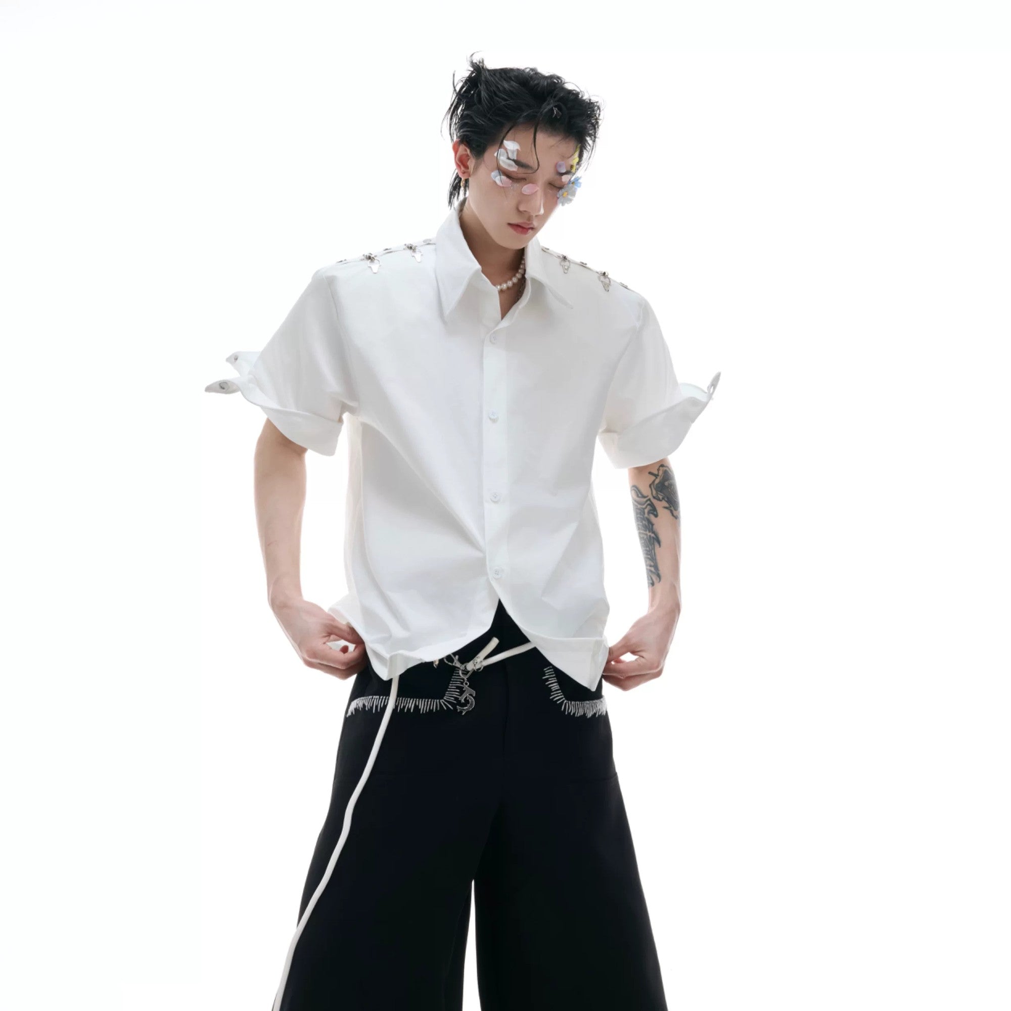 Close up of the industrial metal aircraft buckle on the shirt chest