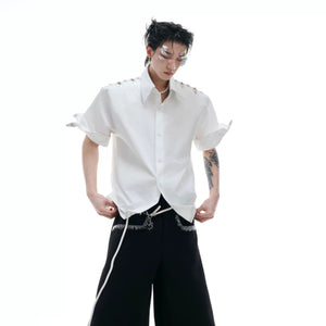 Close up of the industrial metal aircraft buckle on the shirt chest