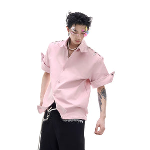 Lifestyle shot of a model wearing the pink boxy fit shirt