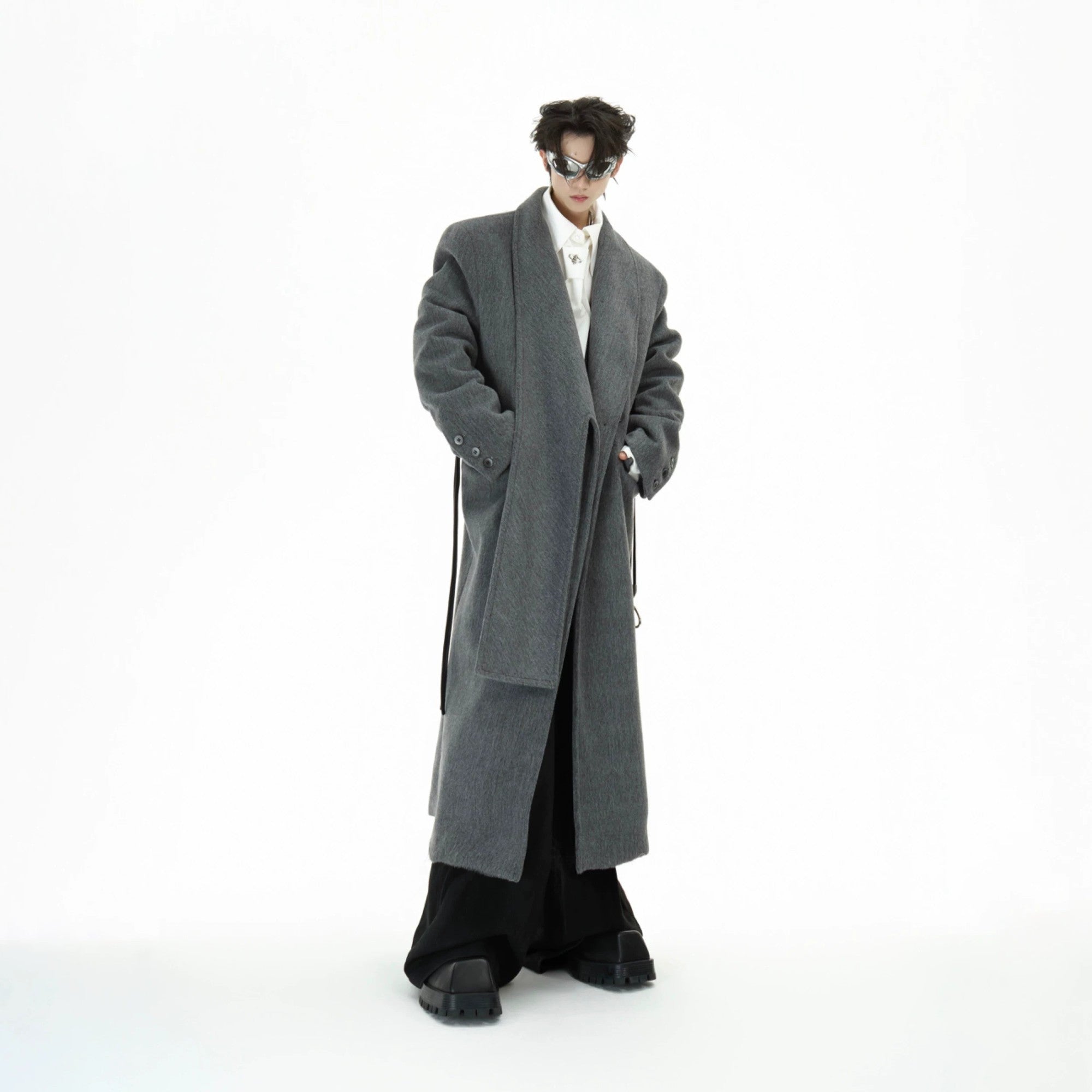 Back view of a long streetwear wool overcoat in gray