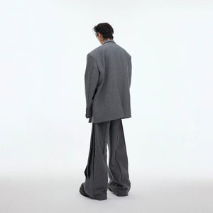 Close-up of the metal rivet details and padded shoulder construction.