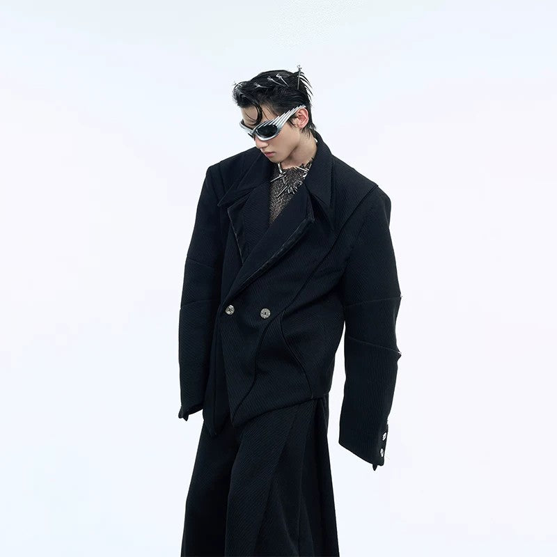 Close-up of industrial metal button details on deconstructed blazer