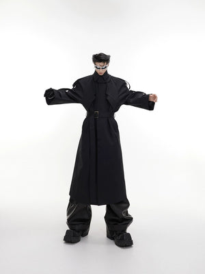 Close up of shoulder pads and 3D design on a black long overcoat