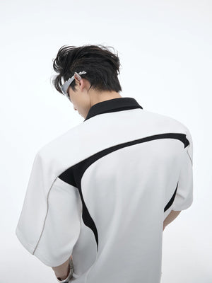 Back view of the contrast color stitching on a loose fit designer polo.