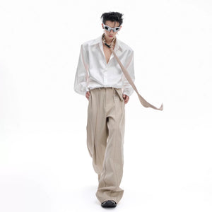 Minimalist brown deconstructed trousers for a clean fit look