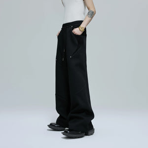 Loose fit streetwear pants with matching deconstructed design elements