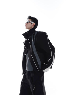 Front view of khaki deconstructed moto jacket in street setting