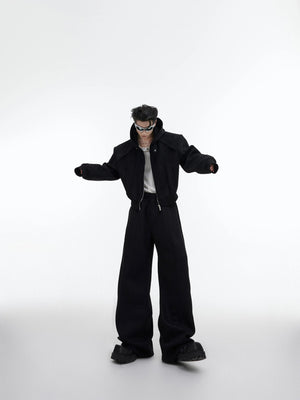 Men's black deconstructed hoodie with subtle shimmering glitter finish