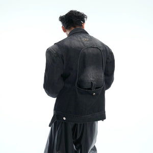 Close up of heavy denim fabric and deconstructed stitching details