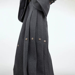 Close-up of heavyweight pleated composite fabric and metal rivets