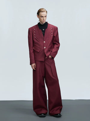 Front view of a red deconstructed wool blazer with 3D tailoring