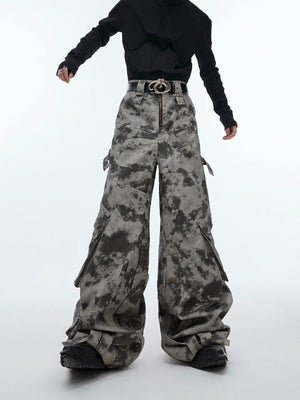 Front view of distressed wide-leg cargo leather pants in gray