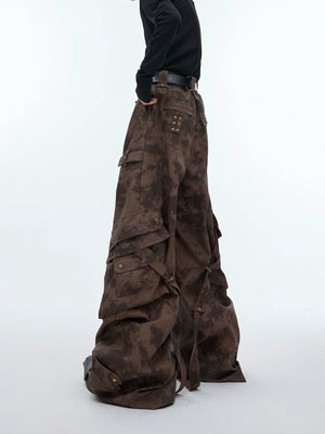 Side view showing multi-pocket design and pleated wide-leg silhouette