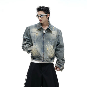 Back view showing the vintage wash and deconstructed denim texture
