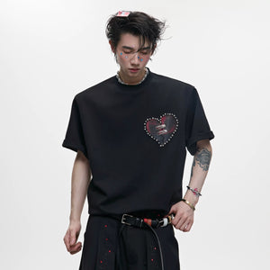 Model wearing a white slim fit t-shirt with heart graphic