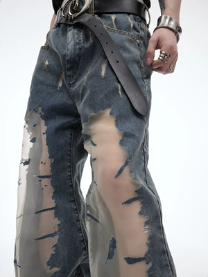 Close up of the deconstructed hollow-out texture and lace details on denim