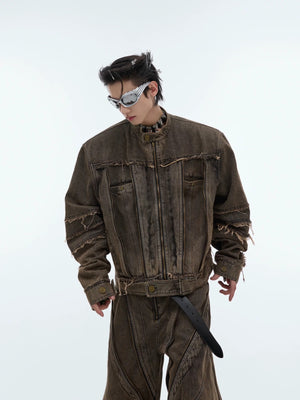 Front view of distressed denim jacket with metal fringe details